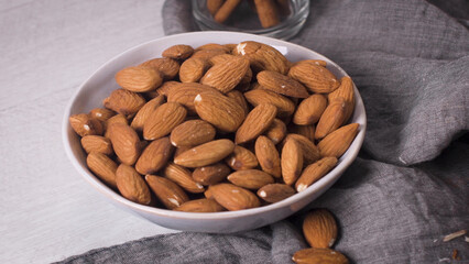 Bowl with peeled almonds