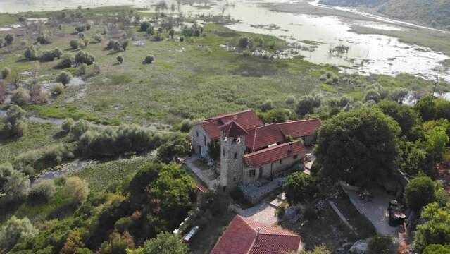 Monastery Kom in Skadar lake. Serbian Orthodox monastery in Montenegro. Religious and tourist attraction of Montenegro.