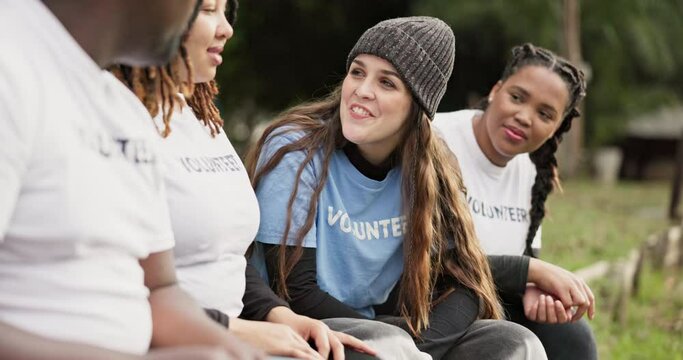 Outdoor, volunteer and group with conversation, planning or happiness with ngo, hope or help. Man, women and friends with support, park or team with community service, sustainability or communication