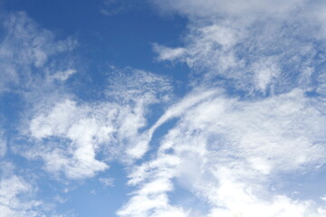 Bright blue sky with white clouds.