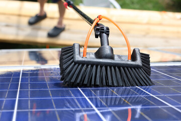 Gentle cleaning of photovoltaic modules with rainwater and soft brush