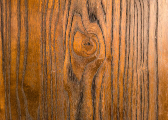 Obraz premium High-resolution close-up of a wooden table’s grain pattern, featuring intricate details and rich textures. Ideal for design templates, material backgrounds, or wood-inspired decor themes