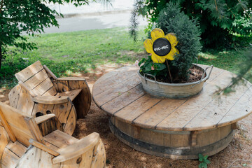 Cute wooden picnic table in a public park. Pic-nic time.