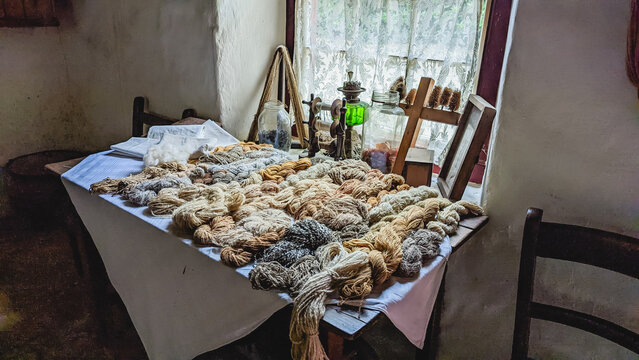 Woolen yarns on a table inside a traditional 18th century Irish cottage