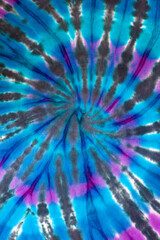 Spiral colorful tie dye pattern full frame background. blue, turquise and purple