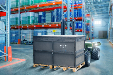 Unmanned forklift. Modern warehouse equipment. Forklift robot moves crate hazardous products....