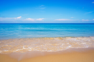 Fototapeta na wymiar Blue sea with beach sand landscape nature in blue sky sunshine day
