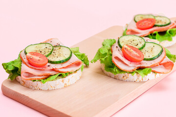 Light Breakfast. Quick and Healthy Sandwiches. Rice Cakes with Ham, Tomato, Fresh Cucumber and...