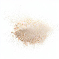 Small amount of beige powder loose powder on white background