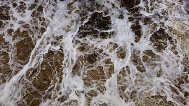 Bubbling and swirling dark water from above. Environmental background