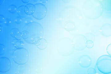 Beautiful Transparent Blue Soap Bubbles Floating in The Air. White Space, Abstract Fun Background, Blue Gradient Blurred Background, Refreshing of Soap Suds Bubbles Water.