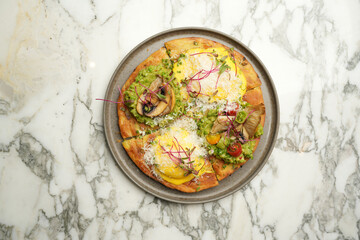 Puff pastry pizza with baked vegetables and mushrooms