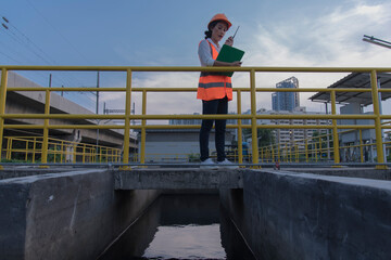  worker on Wastewater treatment concept.  Service engineer on  waste water treatment plant.
