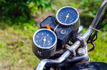 black dial shows the speed of the motorcycle.