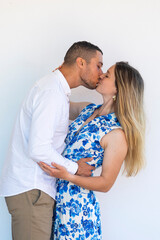 Happy couple over white background.