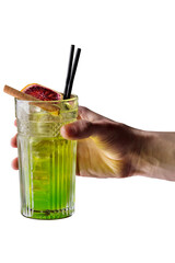 Bartender holds an green cocktail with orange slice - 628154296