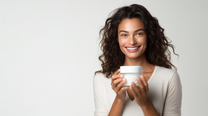 Jound woman holds jar with cosmetic cream. Attractive woman with perfect skin on gray background. Created with Generative AI technology.