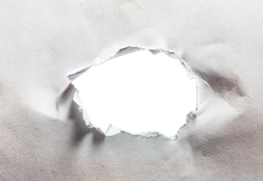 Hole in torn paper. Empty transparent space inside
