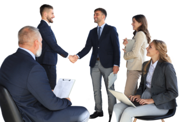 Business people shaking hands, finishing up a meeting.