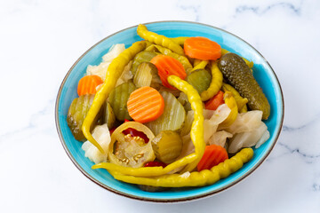 Assorted mixed pickled vegetables in bowl - plate, Turkish name; tursu.
