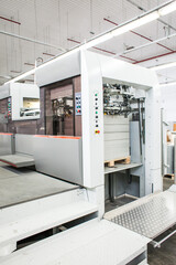 The equipment for a press. Offset machine at the printing manufacturing. Printing machine