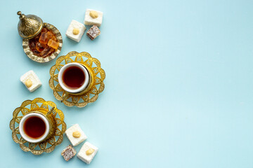 Tea party concept. Traditional Turkish tea with sweets and nuts