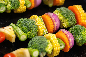 Various kind of vegetable skewer for BBQ party meal. Food object photo, close-up and selective focus.