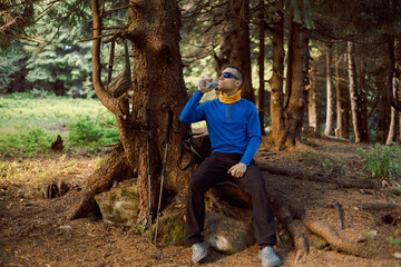 person running with dog in the woods