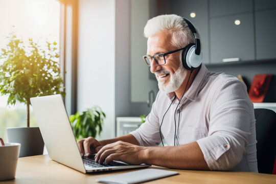 Senior man wearing a headphones and using a laptop as a means of learning. Concept image on online education. Generative AI.