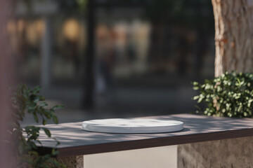 3d ceramic display podium on the wooden bench with blurred background. 3d rendering of realistic presentation for product advertising. interior illustration.