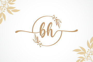 luxury gold signature initial bh logo design isolated leaf and flower