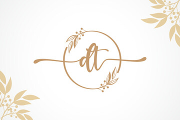 luxury signature initial dt logo design isolated leaf and flower