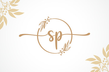 luxury gold signature initial sp logo design isolated leaf and flower