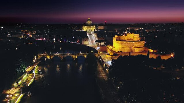 rome vatican city aerial view drone at night dusk,flying forward to castel sant'angelo and saint peter basilica