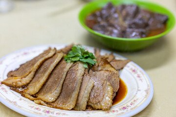 Asian food braised soy sauce with slice of goose