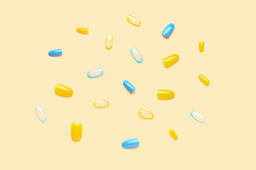 Press-on nails on beige background