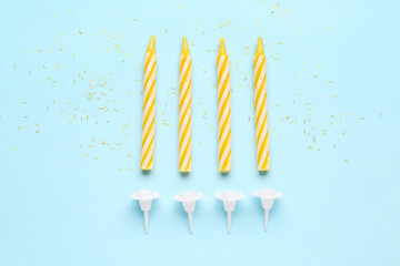 Birthday candles on blue background