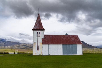 Fototapeta premium The village church in Hellnar, an old fishing village in the Snaefellsnes peninsula of Iceland