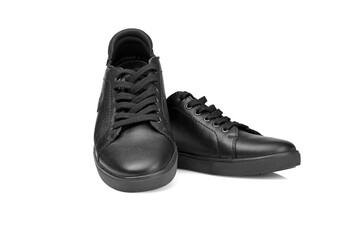 black leather sneakers on a white background