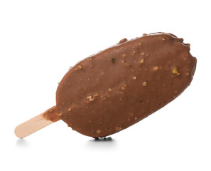 Delicious chocolate covered ice cream on stick against white background