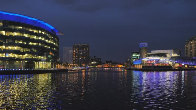 Manchester,england 01/09/2019:establishing shot of manchester salford quays illuminated at night