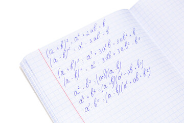 Copybook with maths formulas isolated on white background