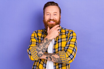 Photo of satisfied glad intelligent person beaming smile arm touch beard chin contemplate isolated...