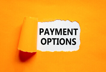 Payment options symbol. Concept words Payment options on beautiful white paper. Beautiful orange background. Business payment options concept. Copy space.