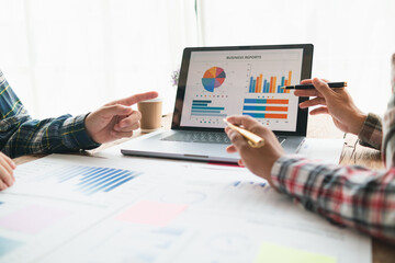 A group of investors and business teams are discussing investment trends for the best results. The concept of hiring an investment consultant to get highly efficient investment advice.