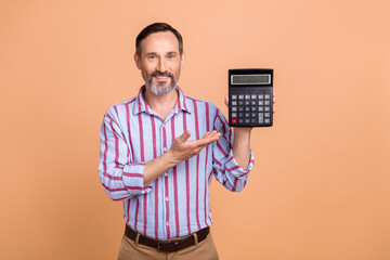 Portrait of positive satisfied elegant person arm hold demonstrate calculator numbers isolated on...