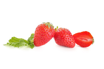 Fresh strawberries with leaves on white background
