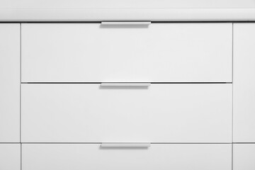 White drawers in kitchen, closeup