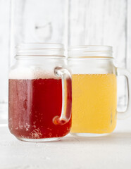 Two kombucha jars