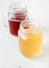 Two kombucha jars